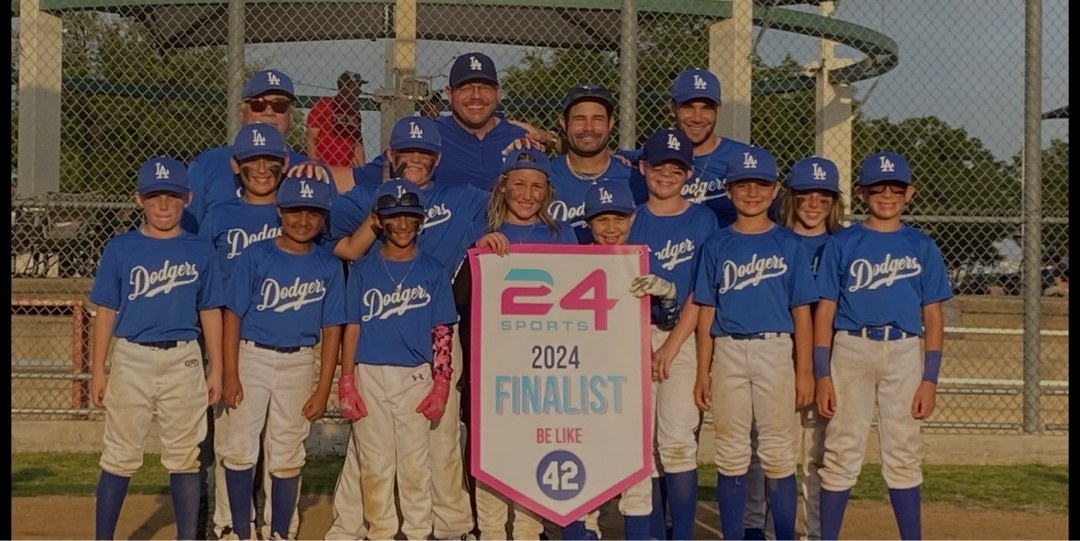 Matt Young and his Dodgers team holding a 2024 Finalist banner