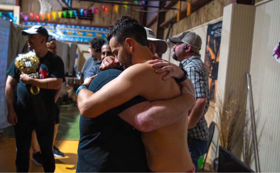 Farewell hug in the ring at the retirement match